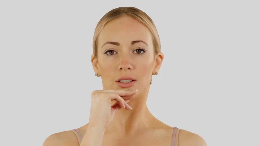 Luyện tập cơ hàm hiệu quả cùng Resisted mouth closing phụ nữ tay đặt dưới cầm