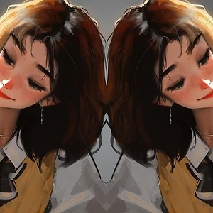 2 cô gái cùng chú mèo đang chơi đùa