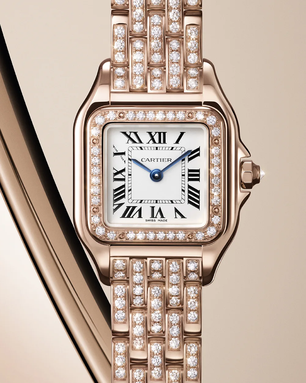 Panthère de Cartier bằng vàng hồng nạm kim cương và đá quý
