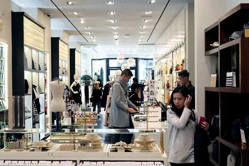 Coach mua lại Kate Spade