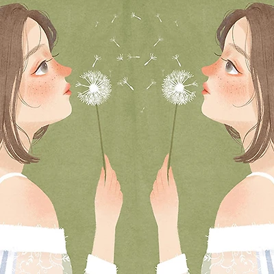 Hai cô gái thổi bồ công anh