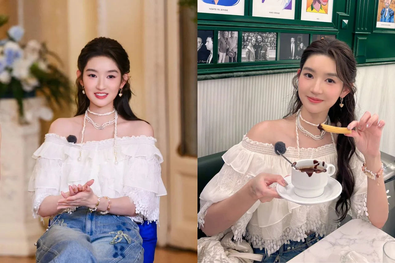 Vương Ngọc Văn dịu dàng với tóc buộc nửa đầu uốn xoăn nhẹ, kết hợp áo trễ vai trắng và trang sức ngọc trai, mang vẻ đẹp nữ tính hiện đại.