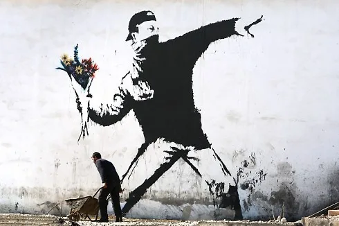 Tác phẩm gây tranh cãi nhất của Banksy ở trên bức tường West Wallở Palestine