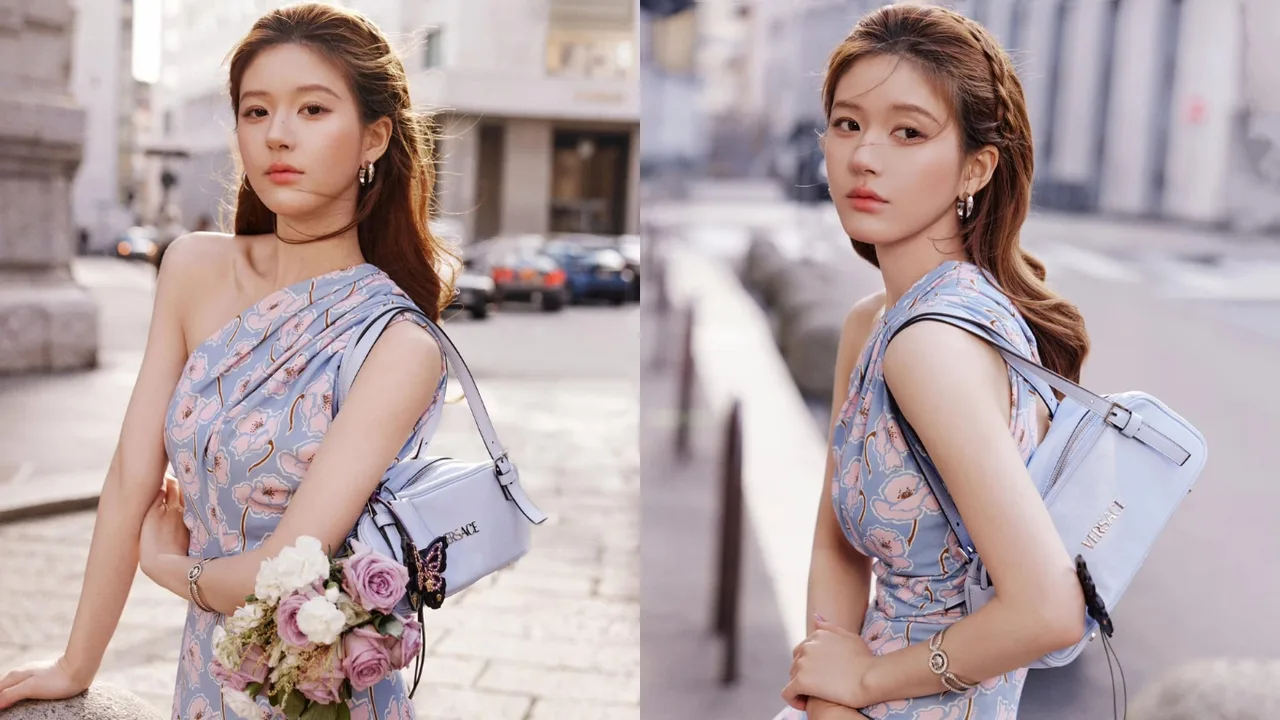 Triệu Lộ Tư mặc đầm hoa lệch vai màu xanh và đeo túi xách của Versace để chụp ảnh chân dung tại Milan Fashion Week