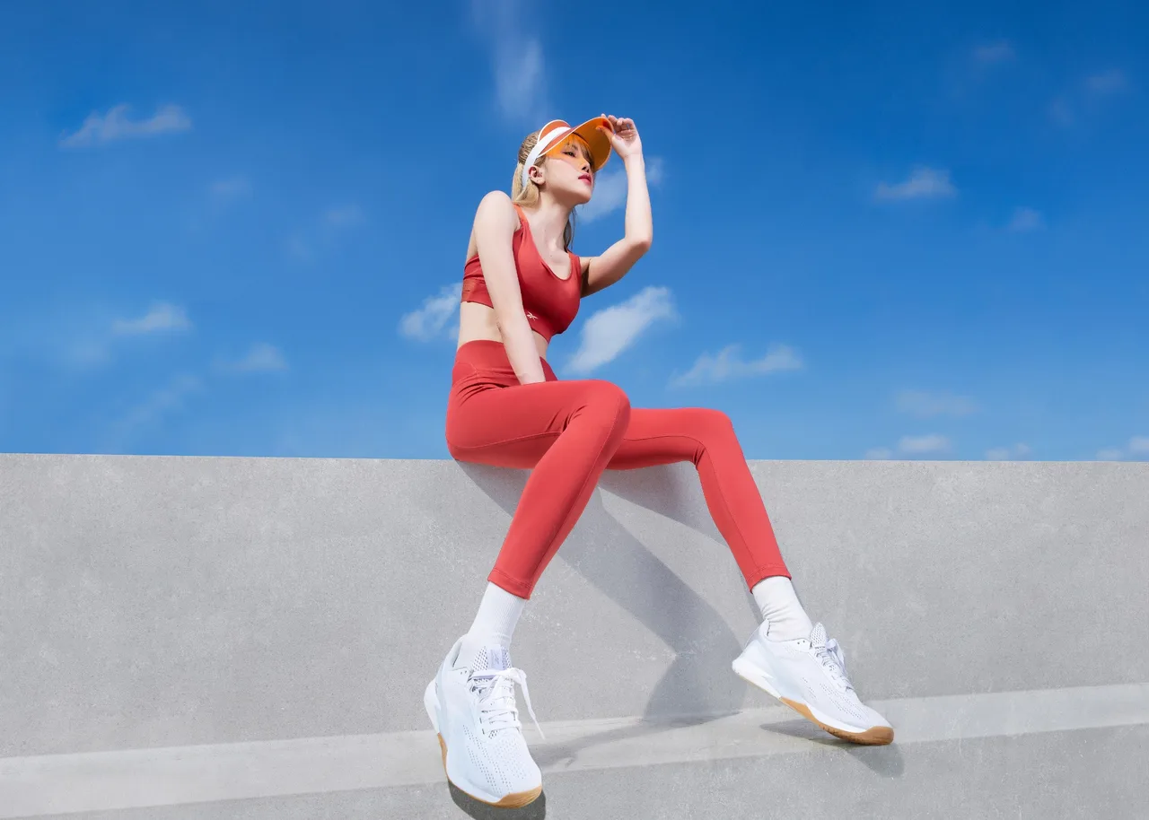 Thieu Bao Tram in red Reebok Kirei gym set Thieu Bao Tram in red Reebok Kirei gym set