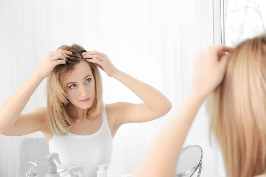 minoxidil trị rụng tóc hói đầu soi gương đường chân tóc