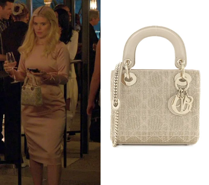 Chiếc Mini Lady Dior đính cườm tinh xảo trên nền họa tiết Cannage là “bức tường thành” vô hình khoét sâu vào rạn nứt giữa Nancy và hai người bạn tri kỷ, giam cầm nhân vật vào sự cô độc đến ngạt thở của giới siêu giàu