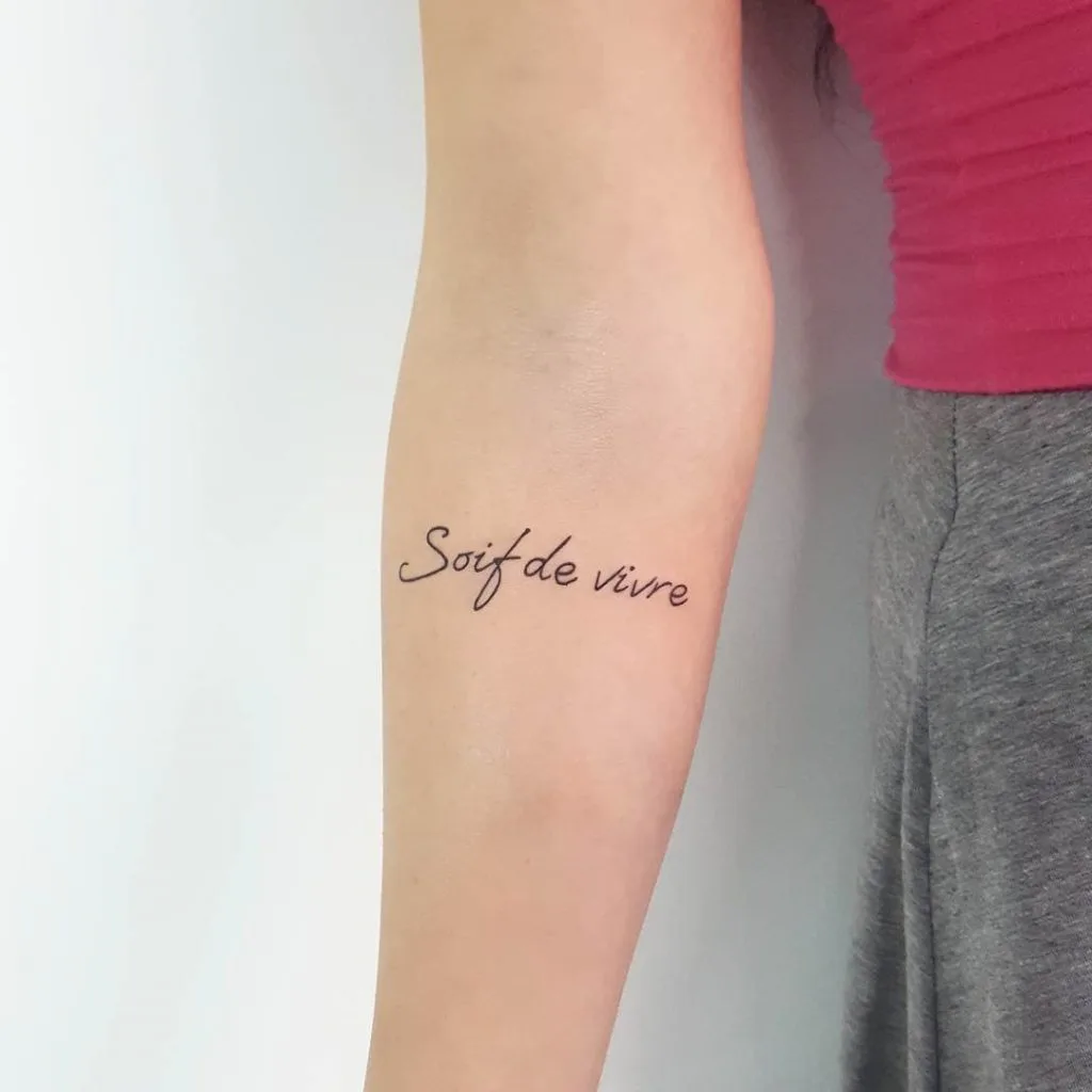 hình xăm chữ Paradisetattoo