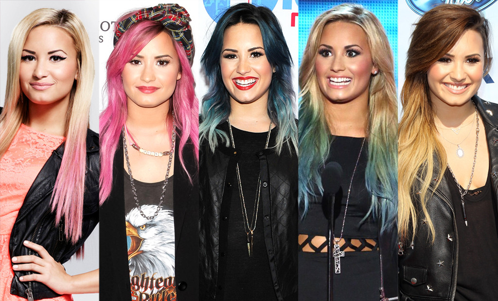 Demi Lovato 2014: Đúng như tên gọi “cô nàng tắc kè hoa”, Demi Lovato tiên phong với các tông màu nóng. Đầu tiên là nhuộm hồng, sau đó là cạo nửa bên đầu và giờ là kiểu tóc layer nhuộm tím. Các kiểu tóc mới này đều giúp Demi trở nên cá tính và nổi bật hơn.