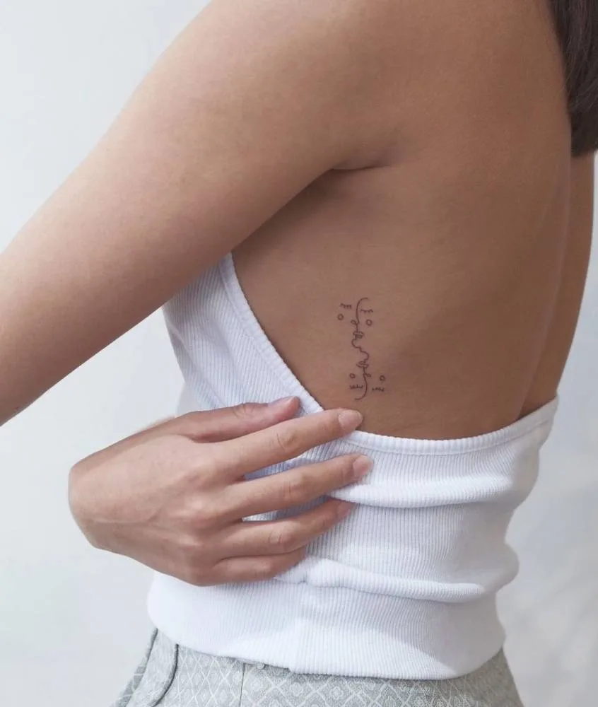 hình xăm mạn sườn kín đáo cho nàng công sở hình xăm mạn sườn kín đáo cho nàng công sở