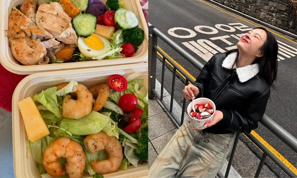 Món salad và cô gái đang cầm hộp dâu tây