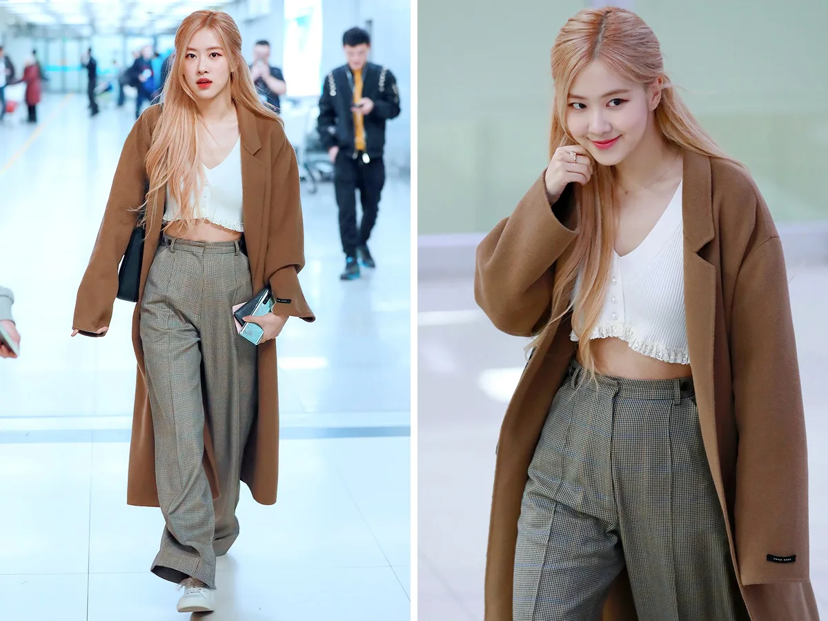 Sao Hàn Rose mặc áo croptop trắng, quần ống rộng và áo khoác dài nâu
