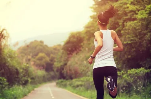 28064-womanrunning-woman-running-pavement.1200w.tn