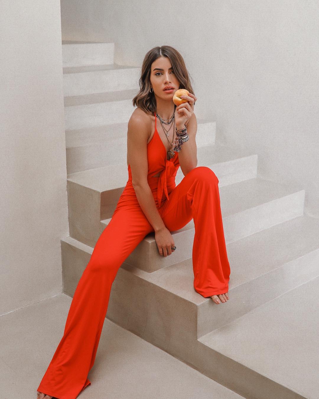 Jumpsuit ống loe hai dây màu cam