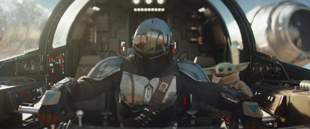 (L-R) Mandalorian (Pedro Pascal) and Grogu in Lucasfilm's THE MANDALORIAN and GROGU. Photo courtesy of Lucasfilm. © 2025 Lucasfilm Ltd™. All Rights Reserved.