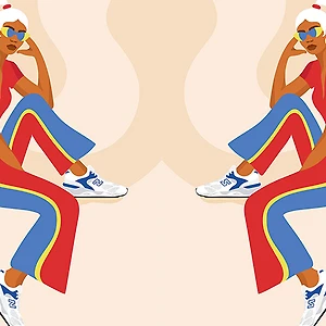 hai cô gái ngồi đối diện nhau trong đôi giày New Balance
